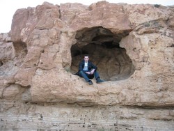 Sitting in the rocks near the blues springs of Meski