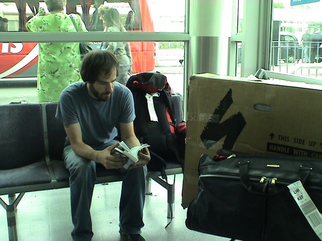 Waiting in the lobby at Heathrow after a last minute Iceland Air Flight.  Caught a flight to Lisbon six hours later.  (6/26/04)