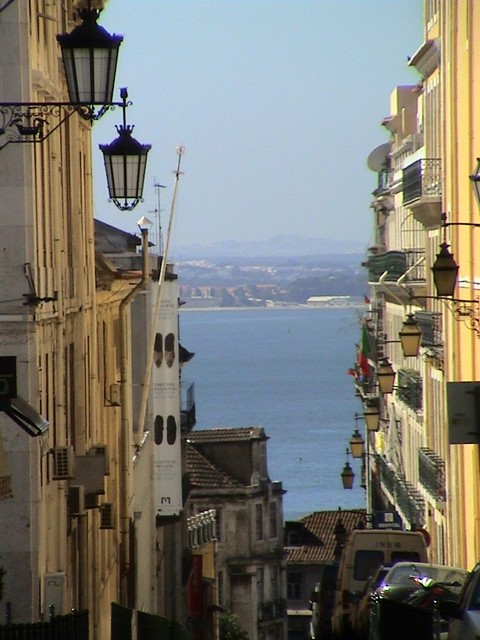 Central Lisbon.  The city is strikingly like San Francisco with the bay, steep hills, cable cars, and even a Golden Gate-looking bridge  (6/27/04)