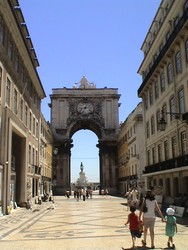 One of Lisbon�s city gates.  Someone approached me with wares to sell.  I told him to be cool and stay in school.  Lisbon has tons of great Indian restaurants and the camping was also great.  (6/28/04)