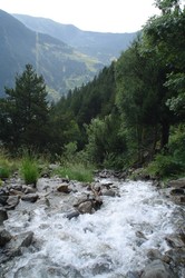 The hills are alive in Andorra, with the sound of music (supporting chorus)!  Come on, is this not a gorgeous - even though puny - nation?  Andorra came along at exactly the right point in my travels, and I took to hiking in the hills for a couple of days.  The only sounds I heard, other than the faint echo of Julia Andrews in the back of my mind, was the humming of insects, the gurgling of mountain streams, or the crashing of waterfalls.  I broke my camera at a waterfall, but I was like the Buddha calmly observing the universe take back and reclaim what it briefly provided.  Thanks for the memories Andorra.  (7/29/04)