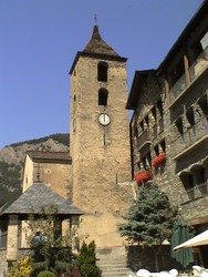 I stayed in a small village in Andorra called Canillo - but this is a photo of Ordino, another small town that I passed through while cycling to a trail head.  These clock and bell towers were in all the Andorran villages, and the bell was gonging every half hour - even to sound out 2:30 in the morning.  It all seemed very Swiss to me.  I camped the whole time in Andorra, and there were some monstrous night time mountain thunder storms, with the skies breaking in bolts of electricity overhead.  There was a lovely English couple camped next to me who would offer me coffee every evening.  (7/28/04)