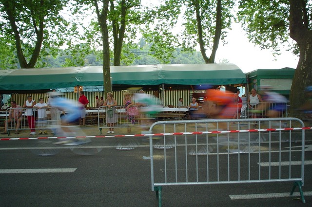 In the evening as I was approaching Dax and exiting the Pyrenees (thankfully) and entering the French plains I ran across a criterium. These cyclists were flying past in a blur. That day I encountered daytime rain for the first time on the trip, which has followed me for several days now.  The first day I did not even pull out my rain gear because it was such a novelty, and let it soak me while thunder rolled in the distance.  But the rains have not gone away and I and all of my clothes are now soaked to a musty dampness.  Every night I hang them out to dry at camp, and every night the rains come again.  But no worries, it makes for a cooler day of cycling.  (8/01/04)