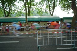 In the evening as I was approaching Dax and exiting the Pyrenees (thankfully) and entering the French plains I ran across a criterium. These cyclists were flying past in a blur. That day I encountered daytime rain for the first time on the trip, which has followed me for several days now.  The first day I did not even pull out my rain gear because it was such a novelty, and let it soak me while thunder rolled in the distance.  But the rains have not gone away and I and all of my clothes are now soaked to a musty dampness.  Every night I hang them out to dry at camp, and every night the rains come again.  But no worries, it makes for a cooler day of cycling.  (8/01/04)