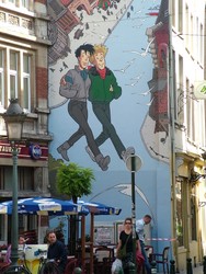 Brussels is big on comics, including its native Tin Tin and Herge, and large murals are located throughout the city, making it feel a little like a Sunday afternoon comic strip.  I think Brussels� main products are beer, chocolate and Tin Tin paraphanelia.  (9/02/04)