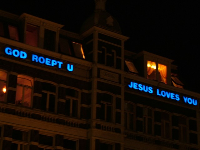 A helpful reminder to all of the visitors to the red light district in Amsterdam.  This building stood on the edge of the coffee-shop filled district.  (9/11/04)
