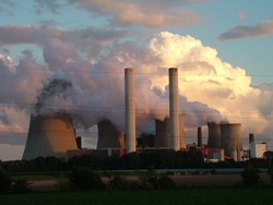 A reactor near Pulheim, Germany, sending clouds of steam into the atmosphere in the sweet light.  (9/14/04)