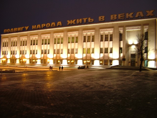 The Minsk hipsters seemed more with it than those in Scandanavia, at least I liked their sense of style more.  But the choice of entertainment seemed less inspiring -  mainly it was drinking beer on the giant city square with a giant TV screen playing state news for ambiance.  This is the unpopulated eastern end of the square.  (12-19-04)