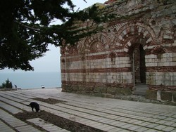 I made it to Nesebar in the early twilight, flying down a 14 km descent coming off the Staria Plania to the coast, and that was all good fun, especially after spending most of the afternoon in the granny gear making the climb that enabled that lengthy descent.  The town was full of churches with some of Bulgaria's best preserved murals, but all the doors were chained shut.  I suppose there are advantages and disadvantages to travelling in the off season.  (1-20-05)