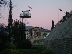 For an island of its size, there is a sizable military presence in Cyprus - mainly in the Turkish north, but there is also a pretty visable UN presence with UN cars cruising about in the south and near the Green Line.  There is also a sizable British contingent, as well as an actual piece of the United Kingdom (more on that later).  This is a picture of the actual Green Line and the UN buffer zone.  You can see the northern side's two flags above the barbwire (RTNC and Turkey) - while on the south it is always the Cypriot flag and that of Greece.  The capital city, because it has been divided for so long, is a wierd experience.   The cultural, political and economic difference across a couple hundred meters of land is really pronounced, so it is a bit like wandering between two countries.  Only the Turkish side bothers to stop you and check and stamp your passport, and on the south side you just wander through (if you do not look Turkish).  (3/4/05)
