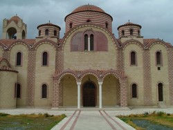 My condition did not improve too much in Larnaka but it was time to head back to the cheaper Turkish side, so I rode about 60 km in that mentally-foggy sick state back to the capital.  Along the way I passed this enormous Greek Orthodox church, just before it started to rain.  Not much to report except for more bed time.  (3/9/05)