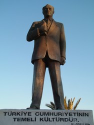 Those who have visited Turkey will probably recognize the Mustafa Kemal Ataturk statue - maybe not this particular statue in Tasucu, but the general concept of the Ataturk statue.  For a man who secularized the Turkish state, his likeness has taken on iconic properties, if the cumulative tonnage of metal used in the legions of inanimate Ataturk monuments is any measure.  Such a statue, or bust, or other variations thereof, can be found in every city and village, often in multiple locations, and his portraits hang in shops, while his image is stamped on every currency note and coin.  A pretty comprehensive, but well-deserved, tribute considering the scale of the cultural, political, religious (and even fashion) restructuring he was able to foist upon the newly established independent Turkish nation - including the history-changing outlawing of the fez.  (3/14/05)