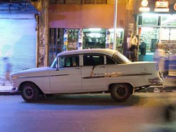 Syria is a little like what I imagine Cuba to be like in the sense that there is an ususual amount of old American and European automobiles still active on the roads.  In any town you can see Peugots, Mercedes, Chevrolets of a vintage that would earn it a historical car plate in the US.  The old Jaguar that I saw in Aleppo probably takes the top prize.  (3/21/05)