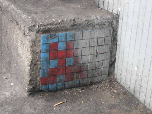 Space Invader in need of a wash on Canal St, North Side, Just West of Lafayette St on a step.