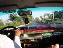 We take a taxi to the hotel